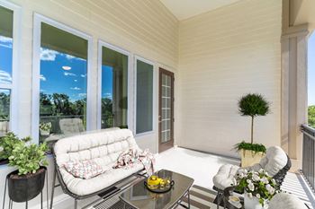 Oversized open air and screened balconies in select apartment homes